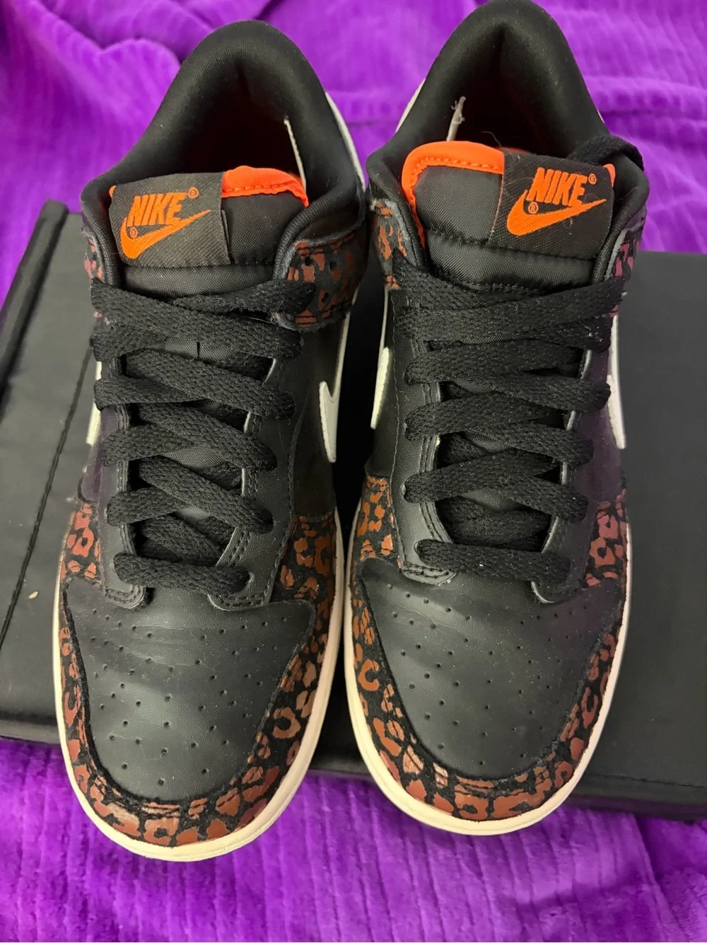 Nike Women’s Low-Top Sneakers in Black with Brown Leopard Accents
